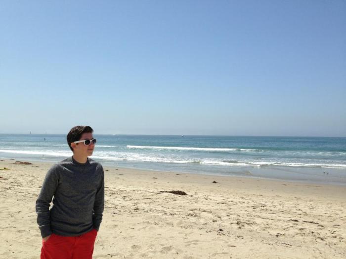 At the beach. I feel complete whenever I'm wearing sunglasses and orange shorts.